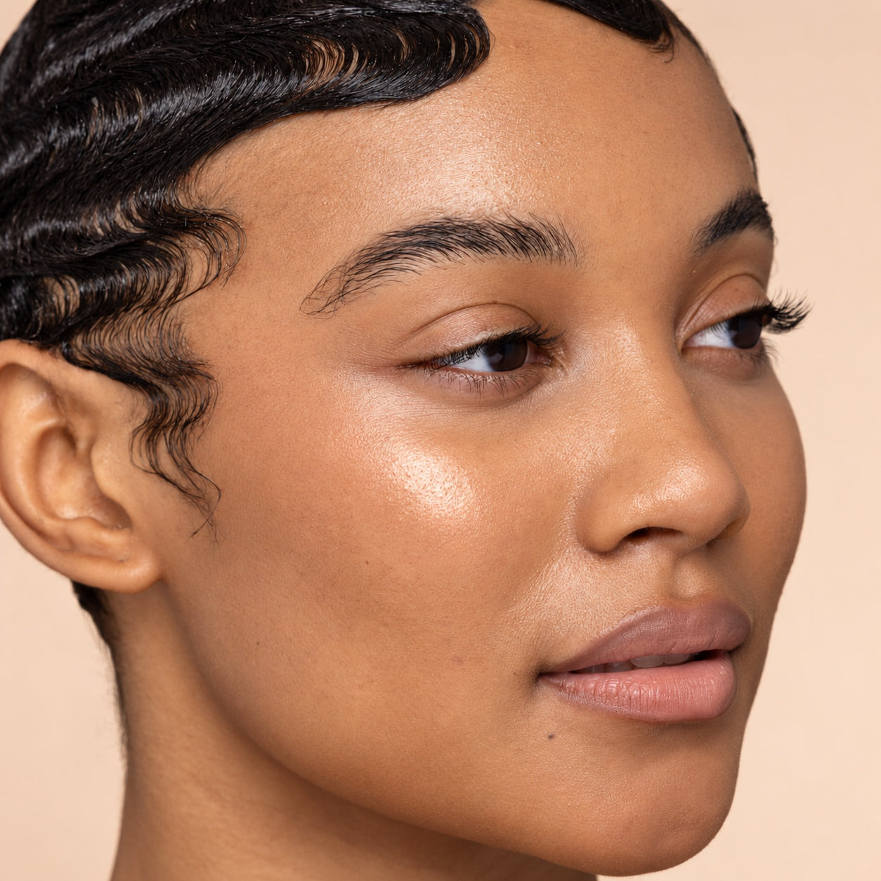 Close-up portrait of an original NFZD Beauty model with natural glowing skin