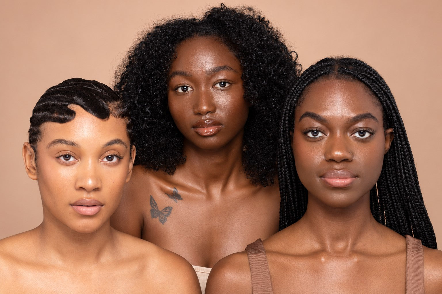 Three original NFZD models with a range of melanin-rich skin tones
